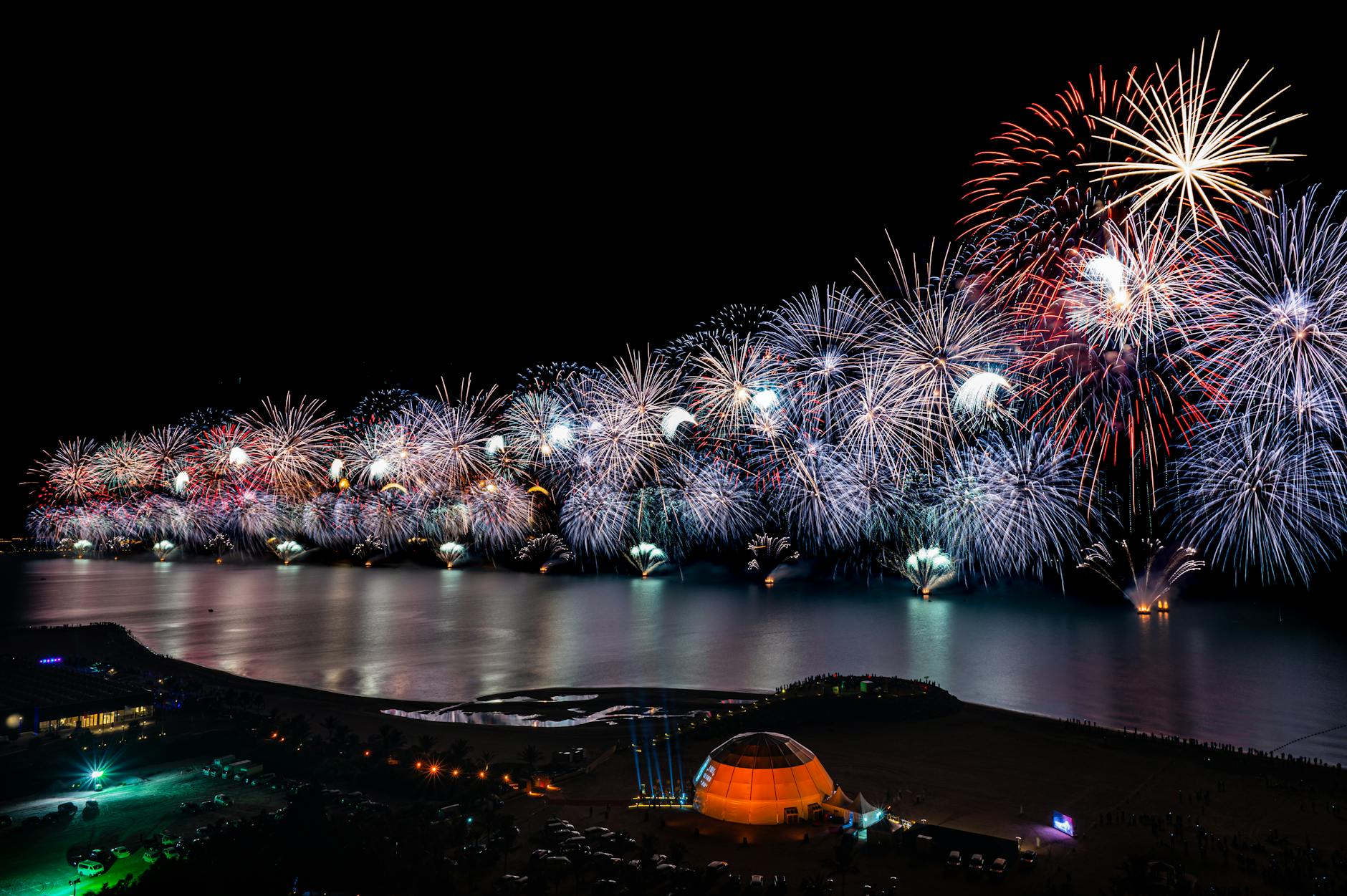UAEThrive Daily News Roundup showcasing the vibrant culture and celebrations in the UAE, with fireworks lighting up the Ras Al-Khaimah waterfront.