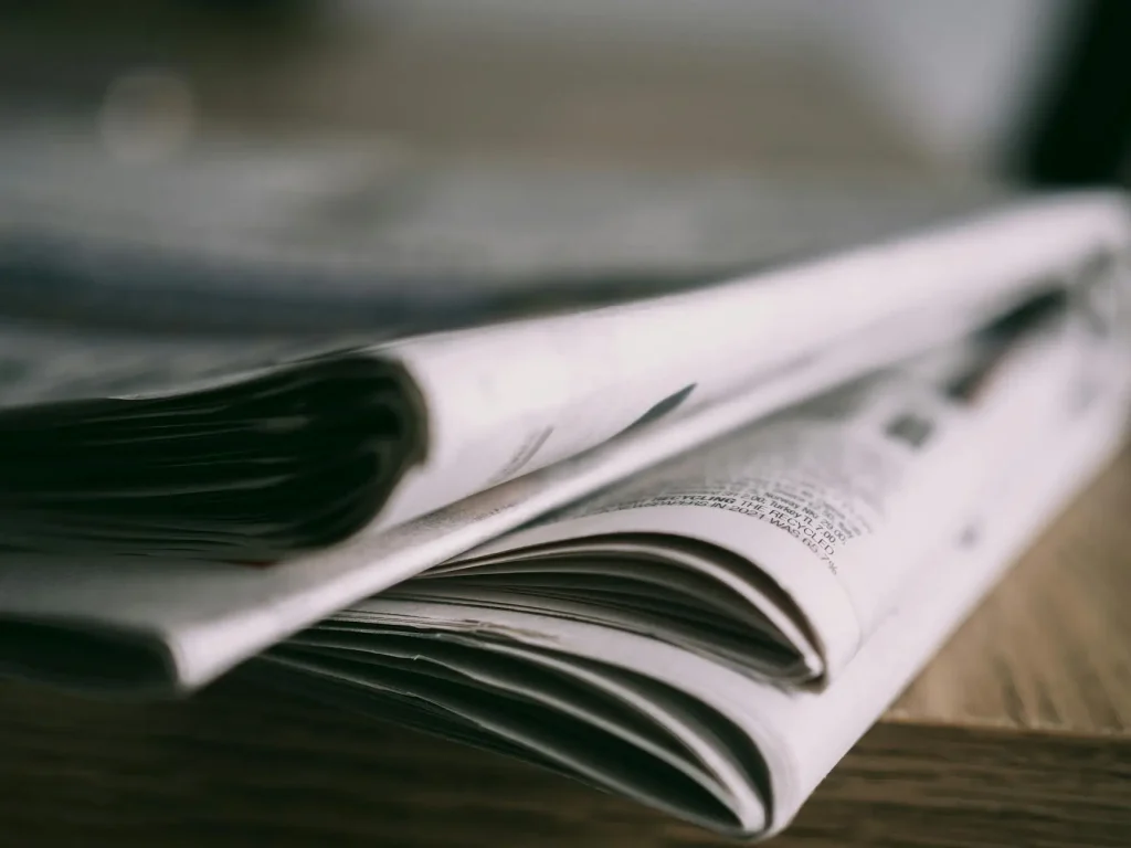 UAE news roundup 22 May 2025—newspapers and coffee cup showing the latest updates across the Emirates
